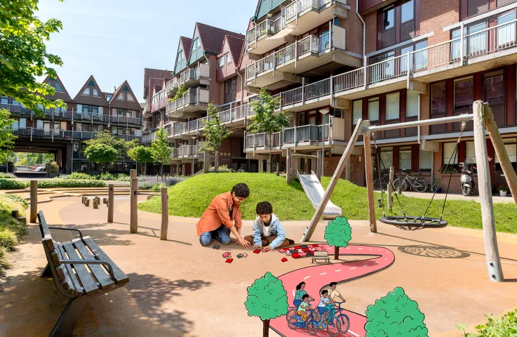 Twee broertjes spelen buiten op de grond en maken samen een puzzel